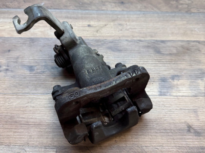 Суппорт задний левый