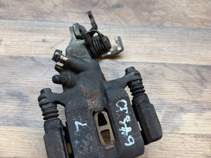 Суппорт задний левый