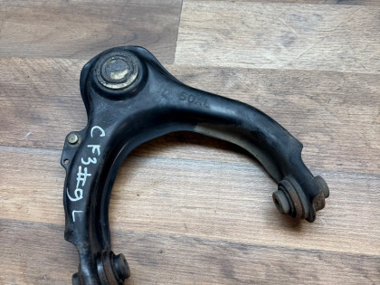Рычаг передний левый