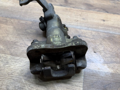 Суппорт задний левый